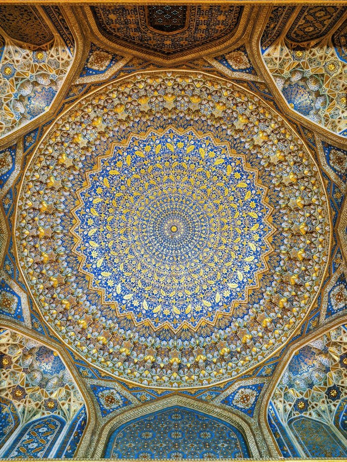 Stunning ceiling inside Tilya-Kori Madrasa, showcasing intricate Islamic patterns and vibrant colors.